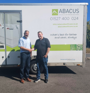 Abacus specialist bathing solutions mobile vehicle with John Preston Ltd.