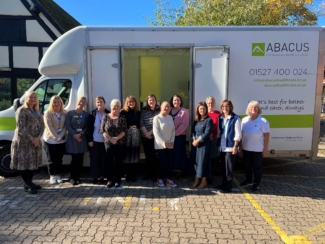 Abacus demonstration vehicle with team